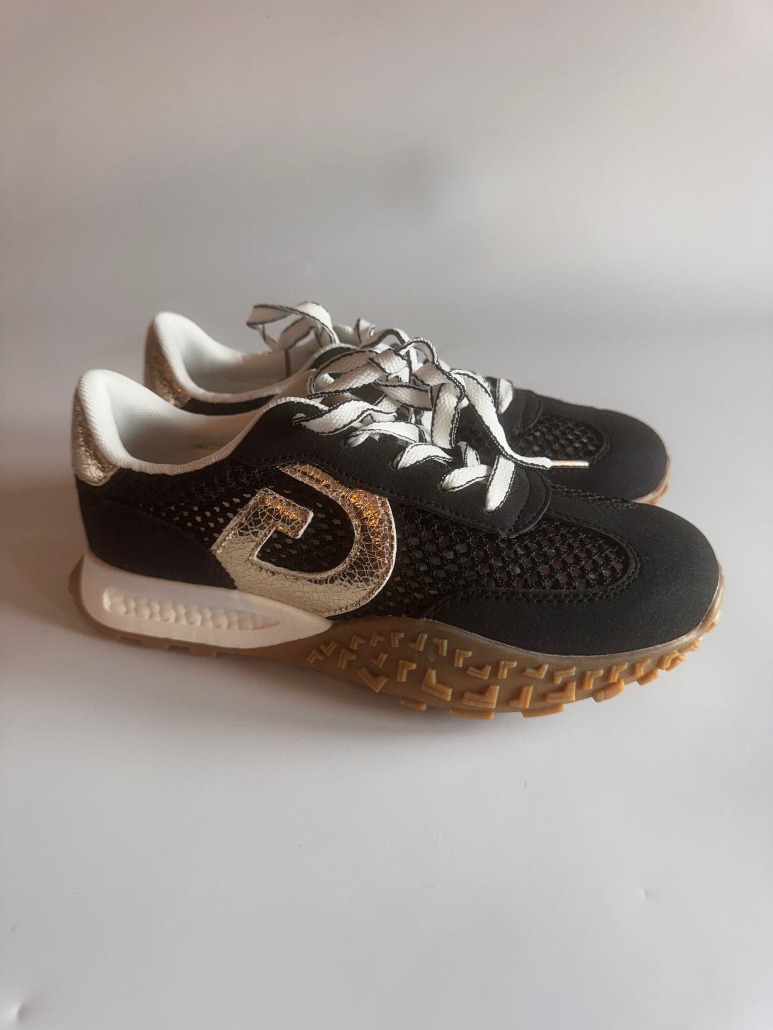 Damen Retro-Sneaker in Schwarz-Gold